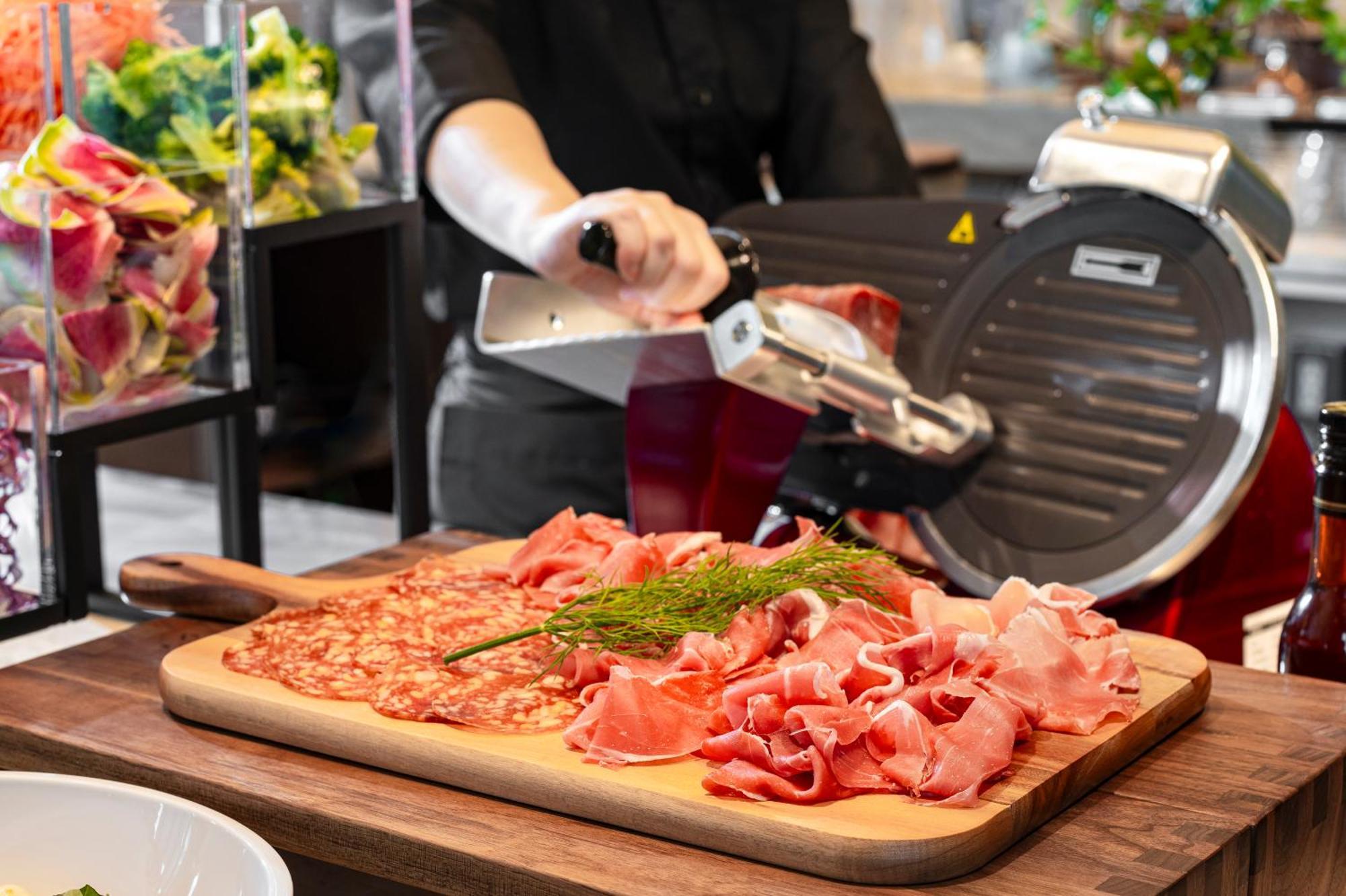 Candeo Hotels Osaka The Tower Екстериор снимка A deli slicer in action